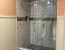 Bathroom remodel with glass door shower.