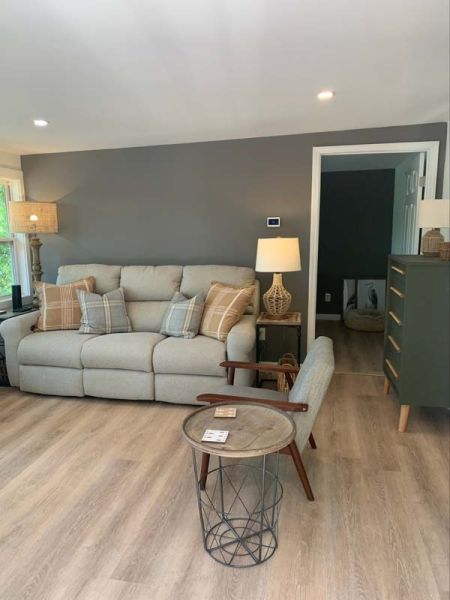 Remodeled interior living room with light hardwood floors.